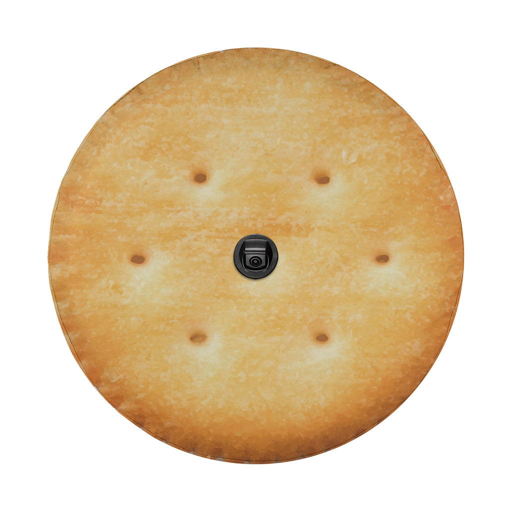 Buttery round cracker stack spare tire cover fabric and grommet closeup detail