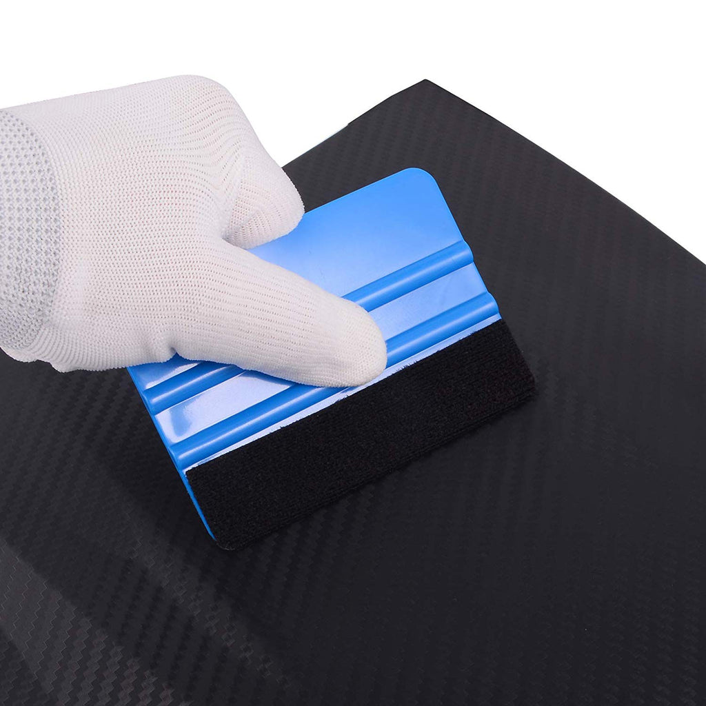Gloved hand flexing blue 4 inch felt edge squeegee decal applicator tool showing flexible plastic body