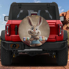 a red Jeep Wrangler with a large Easter bunny sticker on the rear window.