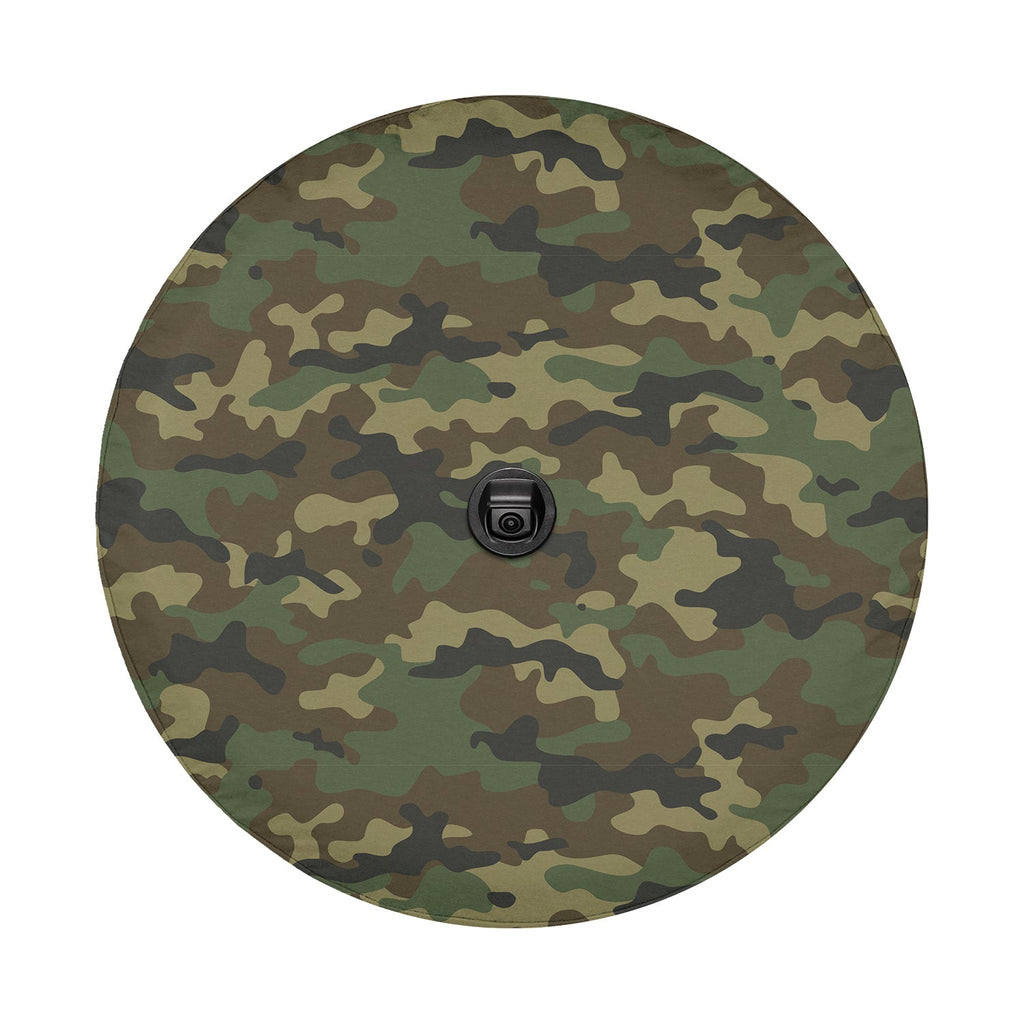 Woodland camouflage tire cover on red Jeep Wrangler with hunting army-style green and tan camo concealment
