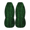 two green, abstract-patterned objects with a repeating, grid-like design.