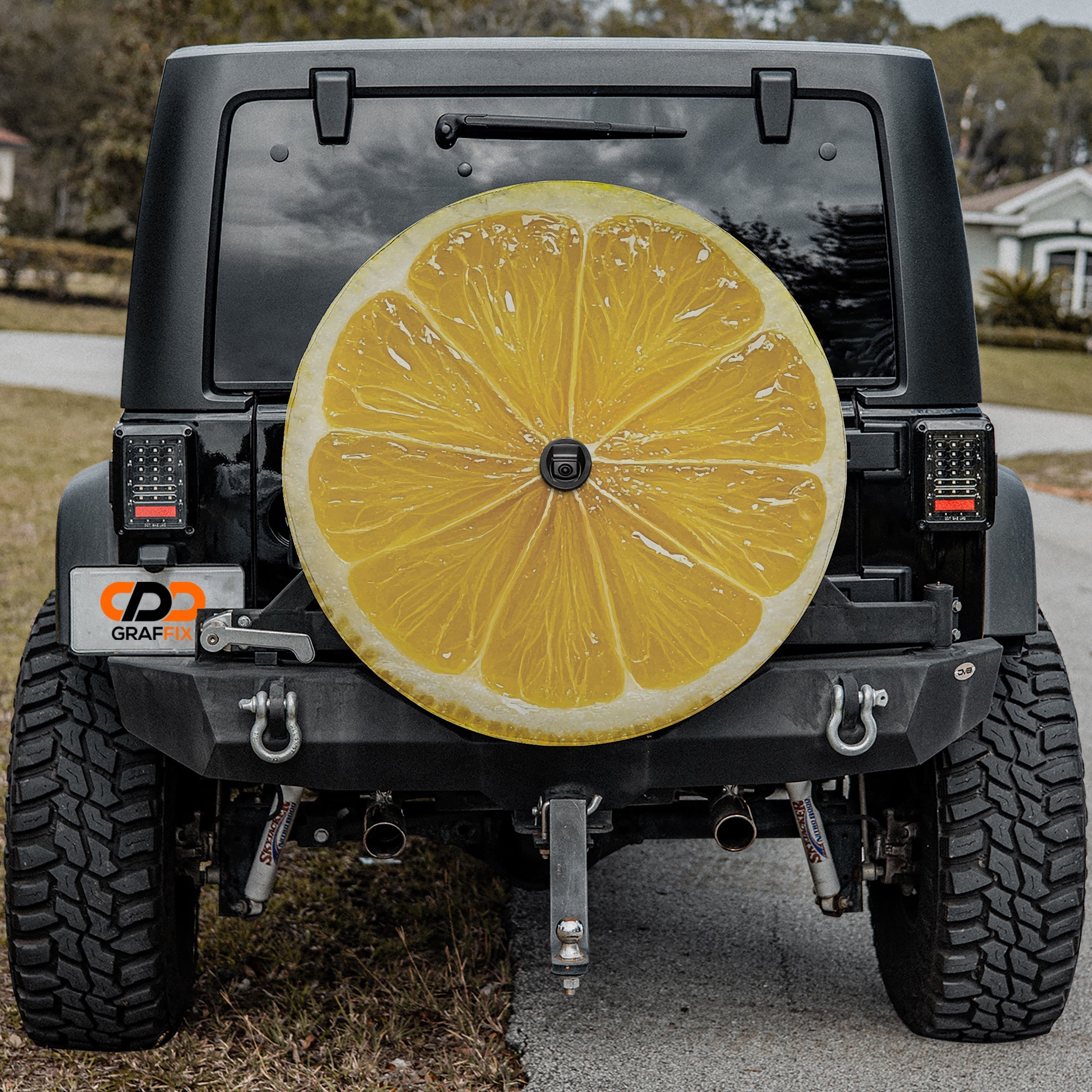 Lemon fruit spare tire cover with yellow citrus slice graphic and juicy sliced lemon design