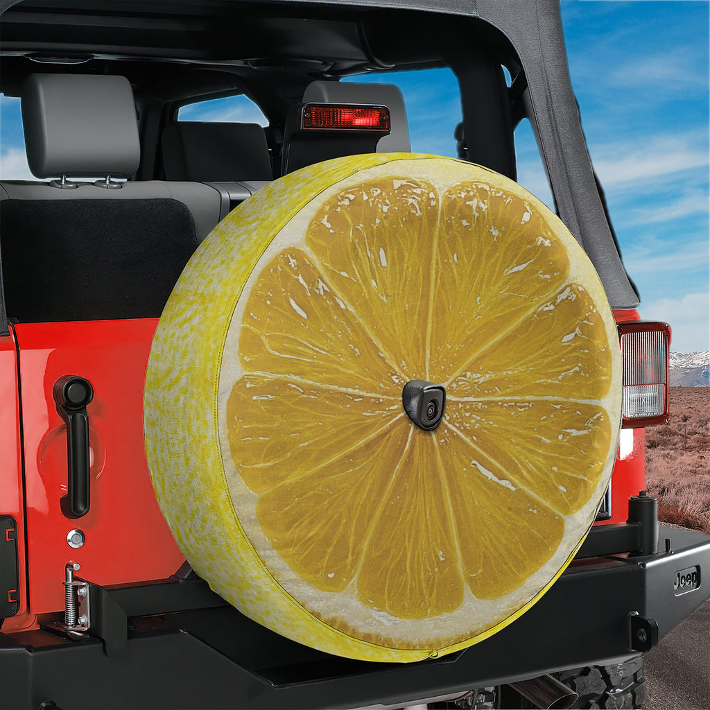 Lemon fruit spare tire cover with yellow citrus slice graphic and juicy sliced lemon design