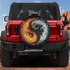 Fire and Ice Harmony spare tire cover on red Ford Bronco rear with orange flame and pale moon design