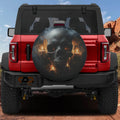 Dark Macabre Skull spare tire cover with dripping wax candles flickering flames and weathered skull art