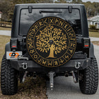 Black Jeep displaying Yggdrasil Norse rune spare tire cover with backup camera cutout installed