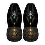 a pair of black shoes with intricate gold and black designs, including a prominent depiction of the Eye of Horus, a symbol associated with ancient Egyptian mythology.