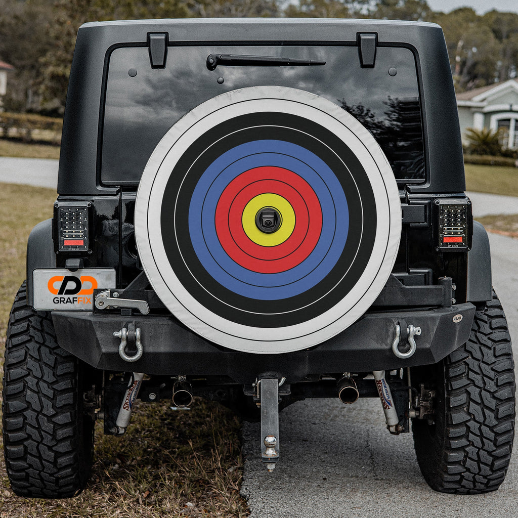 Black Jeep Wrangler with Archery Target ringed bullseye spare tire cover installed on rear