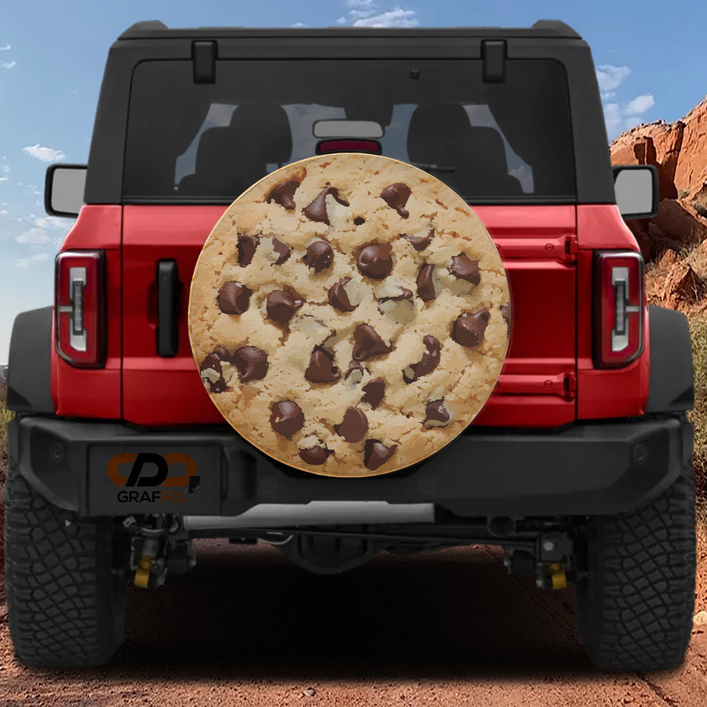 Chip Chip Hooray spare tire cover on a red Jeep Wrangler showing the chocolate chip cookie illustration on the rear