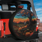 Halloween pumpkin patch spare tire cover lifestyle shot mounted on rear of Jeep at dusk