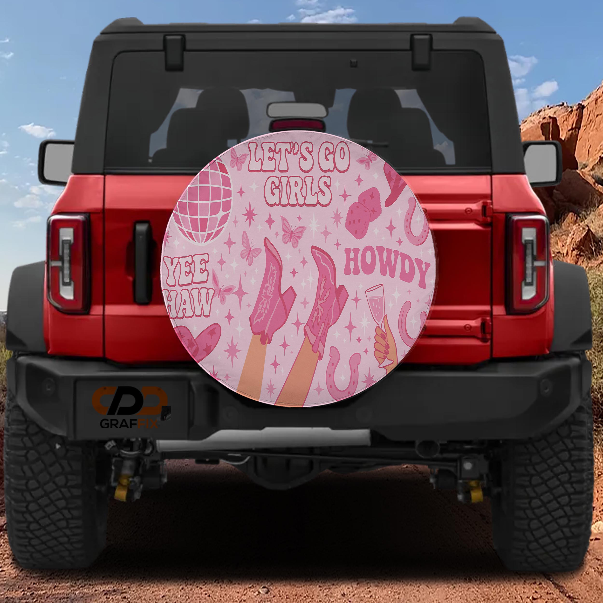 A red Jeep Wrangler with a large, colorful graphic on the rear window.
