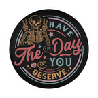 Have the Day You Deserve spare tire cover on red Jeep Wrangler with pastel skeleton typography