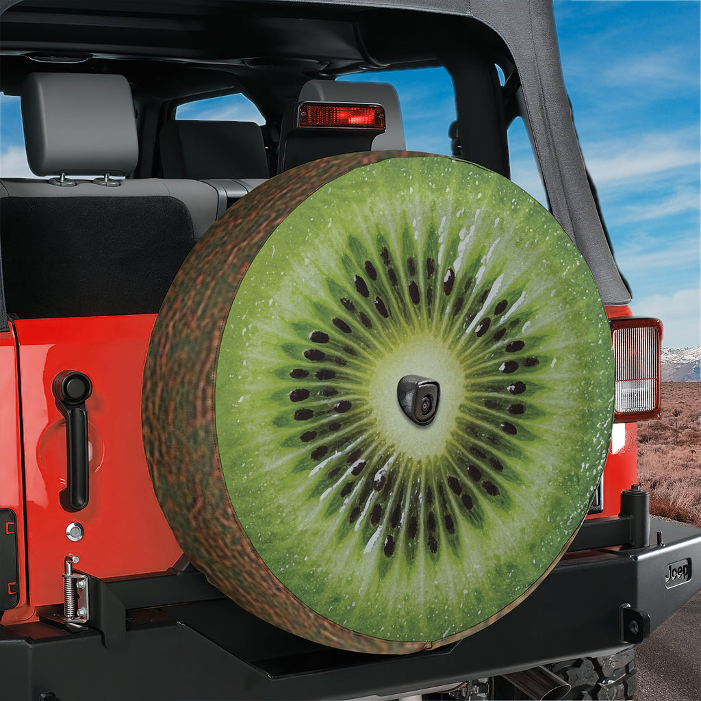 Kiwi fruit spare tire cover with green sliced kiwifruit graphic and seeded center design
