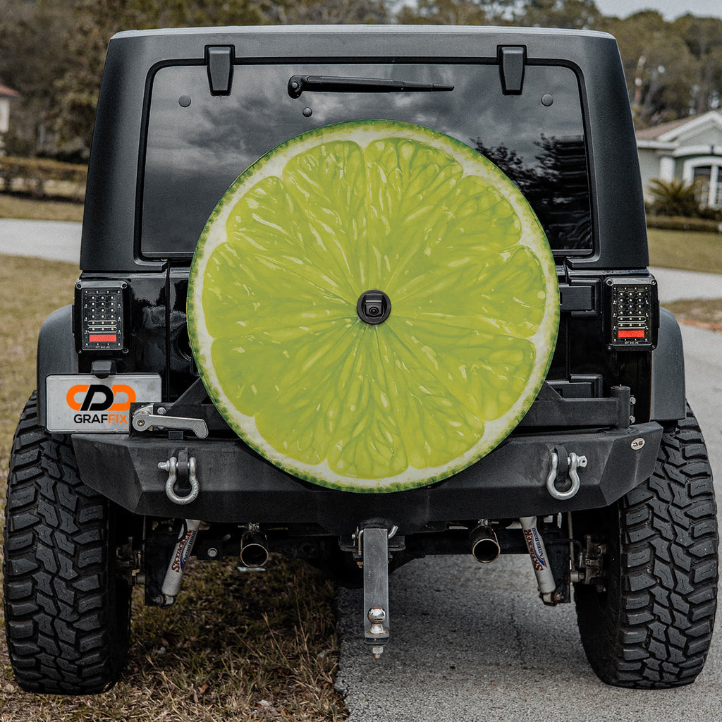 Lime fruit spare tire cover with green citrus slice graphic and zesty sliced lime design
