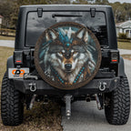 Native American turquoise wolf spare tire cover mounted on black Jeep Wrangler rear