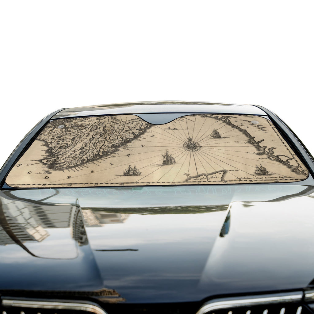 Cartographer Ocean Trail accordion sunshade close-up installed on a dark sedan windshield exterior detail