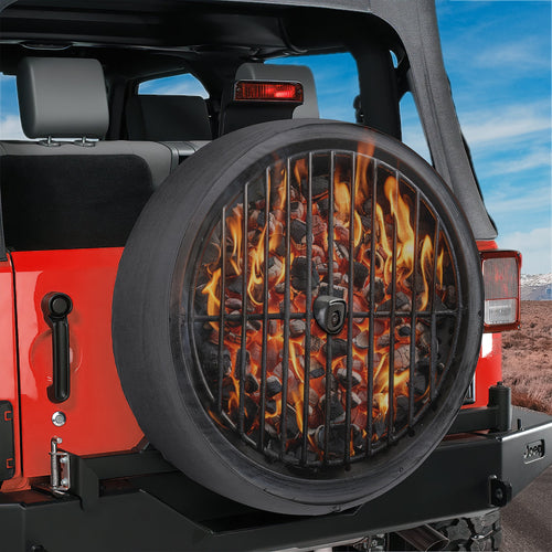 Charcoal grill spare tire cover shown installed on rear of Jeep vehicle