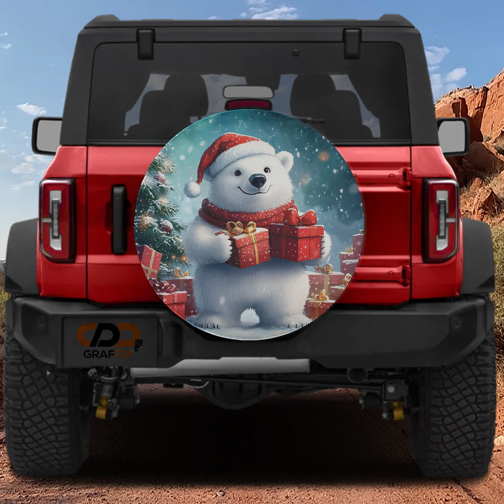 Winter Wonderland polar bear spare tire cover mounted on a red Jeep Bronco rear with snowy gift box scene