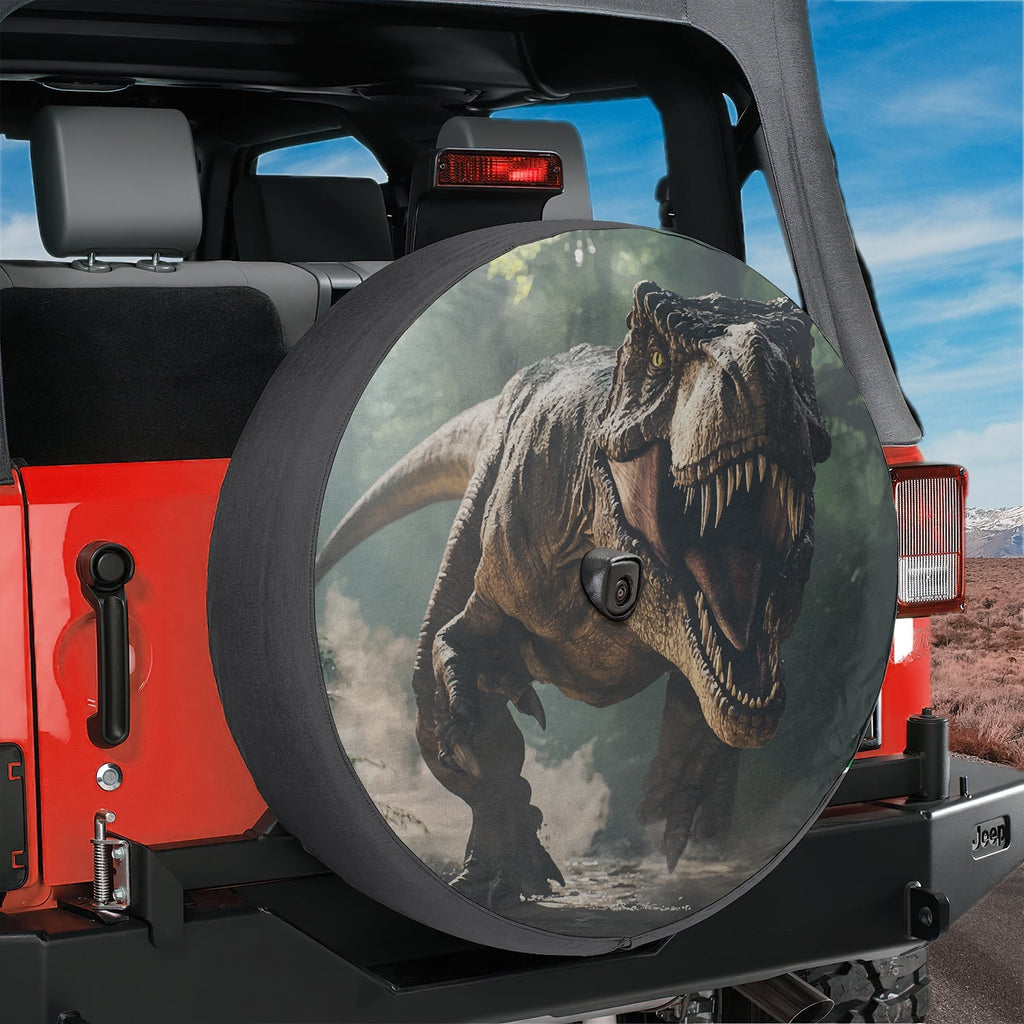T-Rex tire cover on red Jeep Wrangler showing charging Tyrannosaurus rex with backup camera cutout