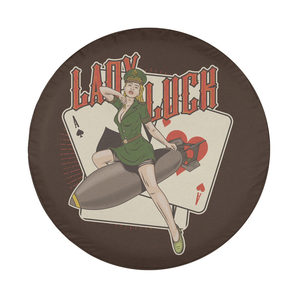 Lady Luck Bombshell spare tire cover detail of WWII military pin-up girl on bomb with aces