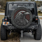 Odin's ravens spare tire cover installed on a black Jeep Wrangler with GRAFFIX rear bumper sticker