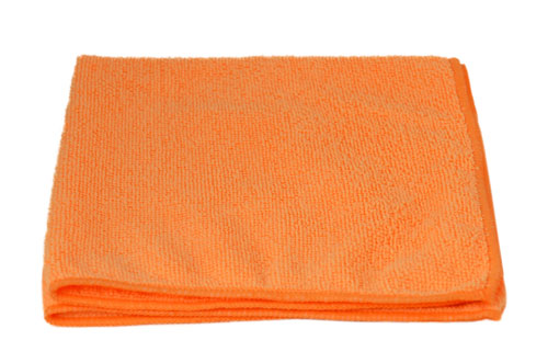 Folded orange microfiber cleaning cloth on white background for vinyl decal application prep