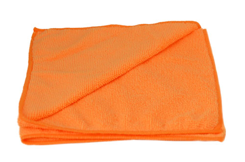 Orange microfiber cleaning cloth folded over with edge detail on white background product shot