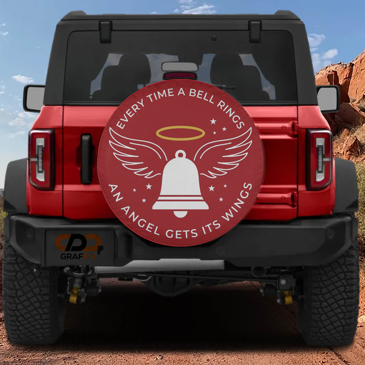 Angel Gets Its Wings Christmas spare tire cover mounted on a Ford Bronco