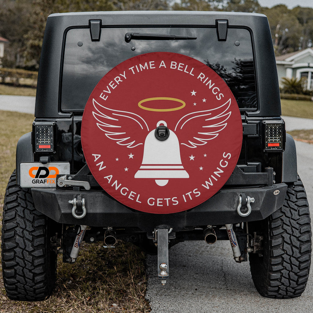 Angel Gets Its Wings Christmas spare tire cover mounted on a Jeep Wrangler