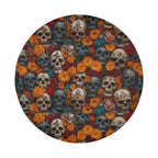 Flowers and skulls tire cover flat round front close-up with marigold flowers, roses, and stacked skulls