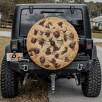 Chip Chip Hooray spare tire cover mounted on a Jeep Wrangler rear wheel with the giant cookie design centered