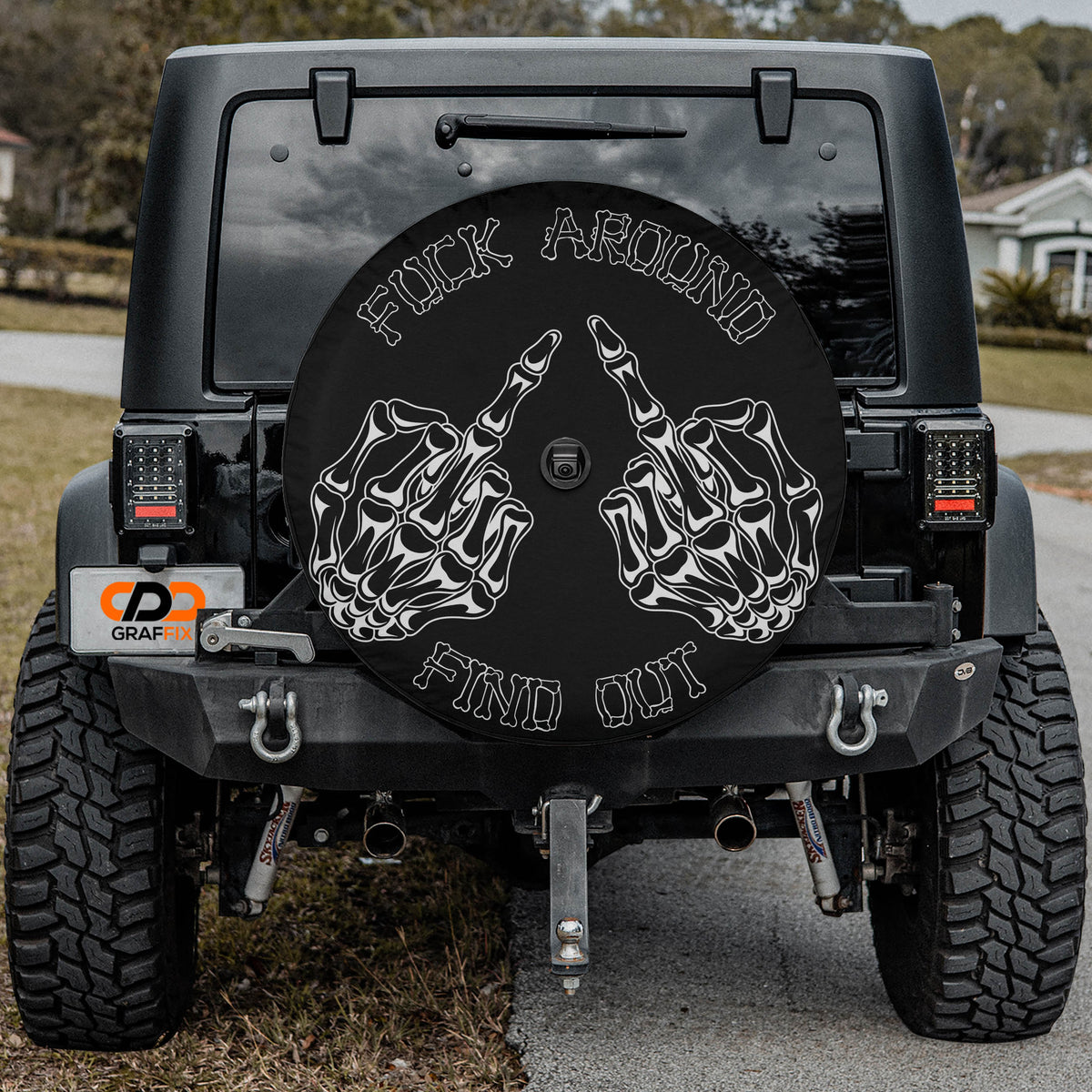 FAFO skeleton hands tire cover shown on a vehicle spare
