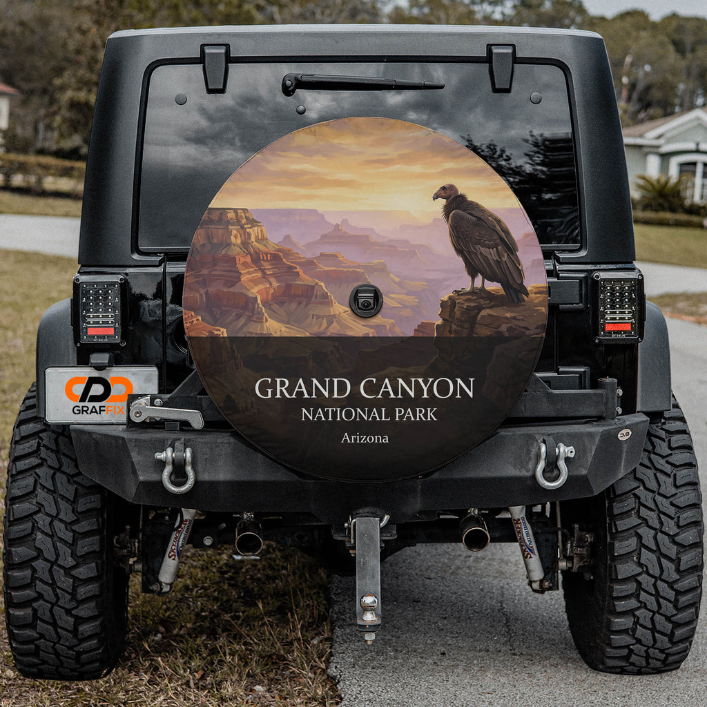 Grand Canyon National Park spare tire cover on a Jeep Wrangler, showing a California condor on the rim above layered canyon walls