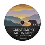 Great Smoky Mountains National Park spare tire cover with a backup camera hole, showing a black bear silhouette on a ridge above layered blue ridgelines