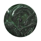 Alien xenomorph spare tire cover named HR Giger biomechanical theme on rear Bronco tailgate desert view