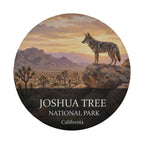 Joshua Tree National Park spare tire cover without a camera hole, showing a coyote on a boulder above a desert flat of Joshua trees