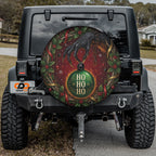 Krampus ornament heist Christmas spare tire cover mounted on a Jeep Wrangler