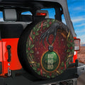 Krampus ornament heist Christmas spare tire cover on a Jeep Wrangler, rear view