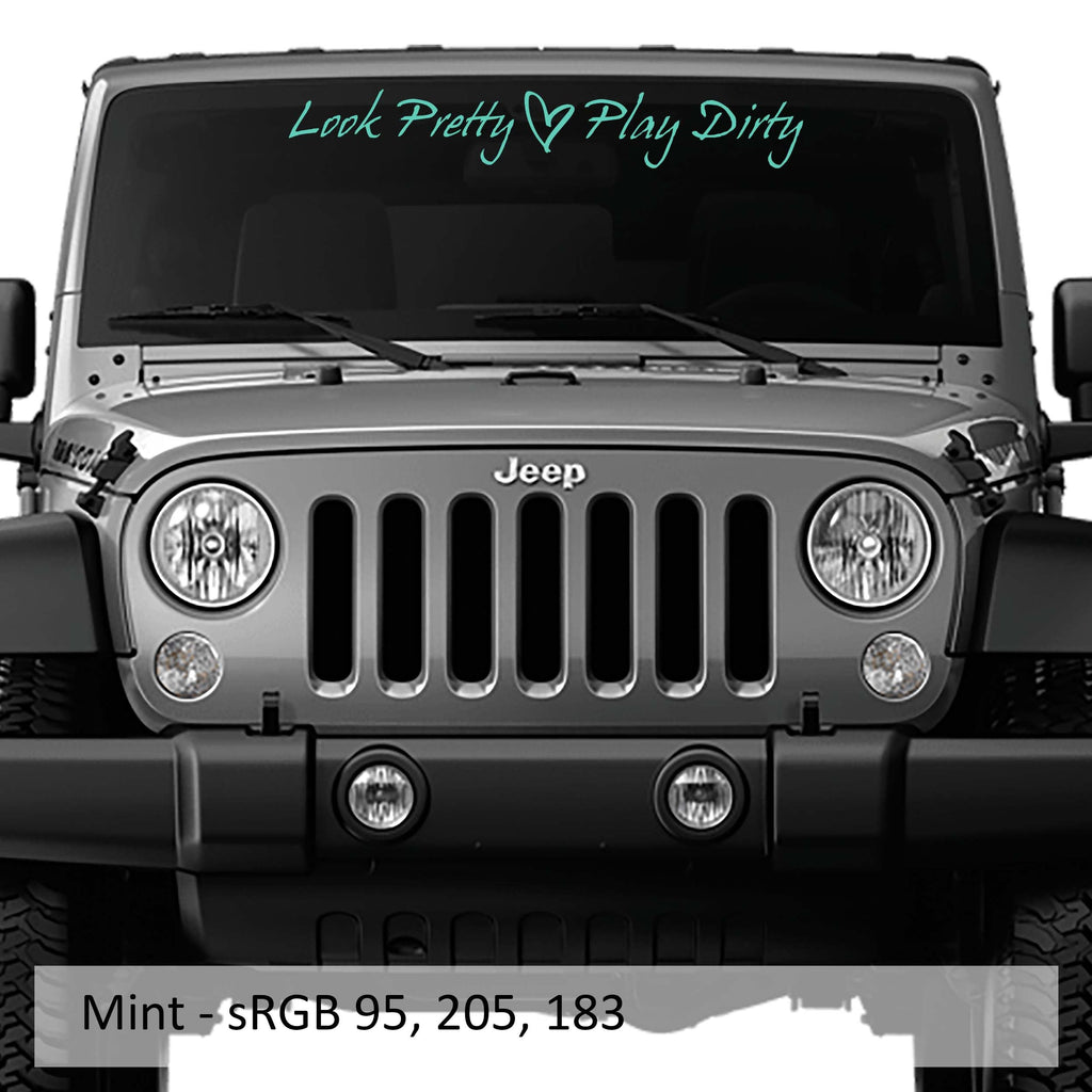Look Pretty Play Dirty windshield banner shown in mint green script vinyl on a clean white studio backdrop