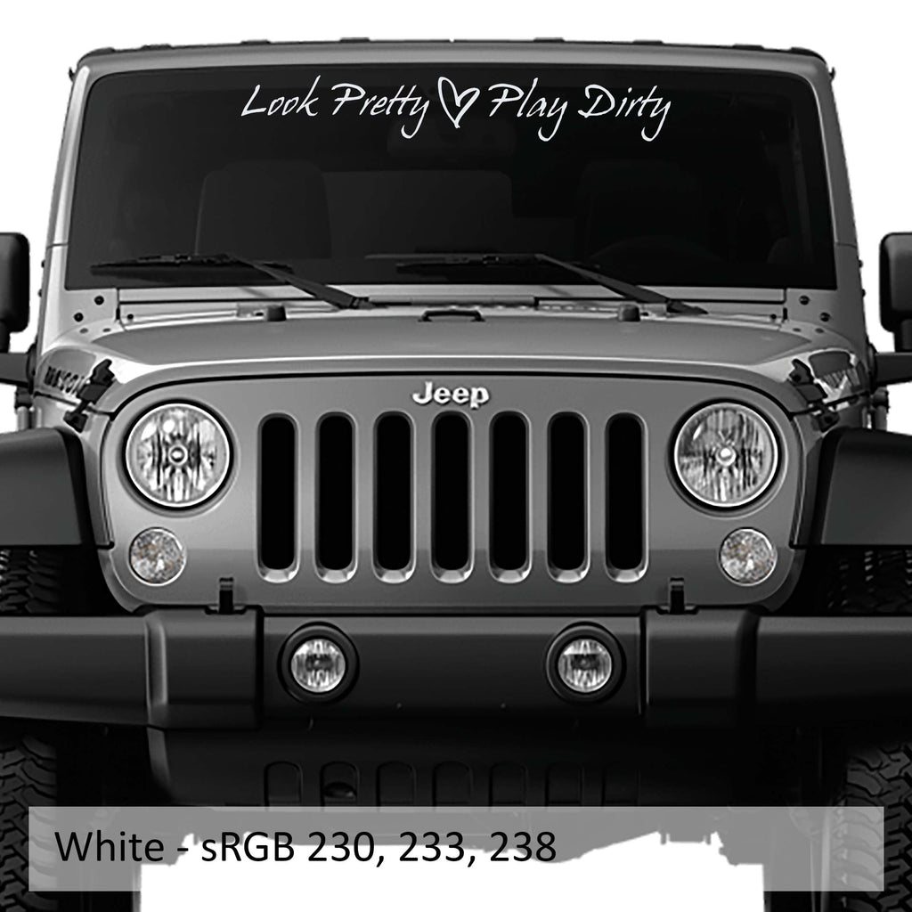 Look Pretty Play Dirty windshield decal in white script with heart applied above Jeep Wrangler grille front