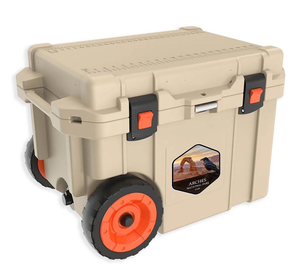 Arches National Park badge sticker applied to the side of a tan hard-sided cooler