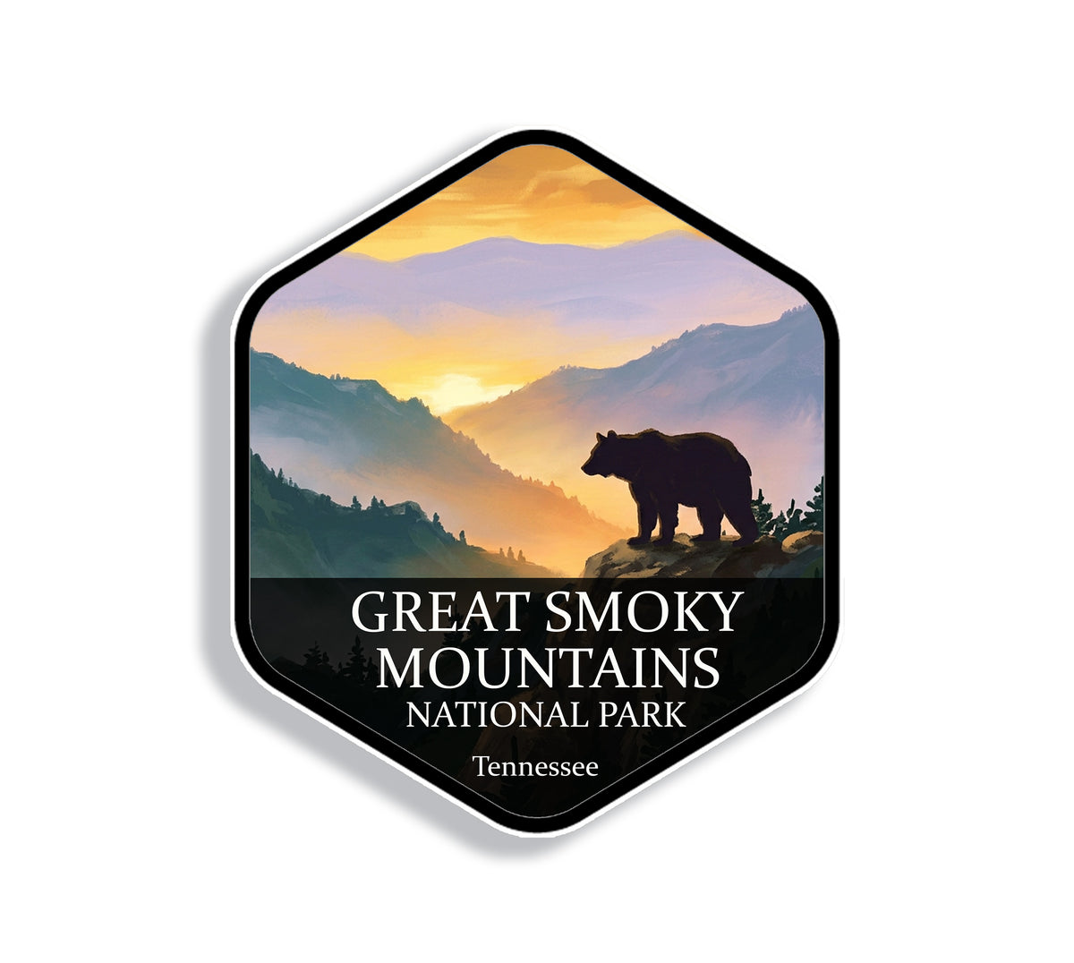 Hexagonal Great Smoky Mountains National Park sticker badge with a black bear silhouette on a ridge above misty blue mountains at sunrise