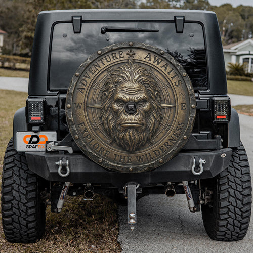 Bronze Compass Sasquatch Adventure Awaits Spare Tire Cover - shown on a Jeep