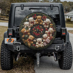 Teddy Bear Wreath spare tire cover installed on black Jeep Wrangler with center backup camera cutout