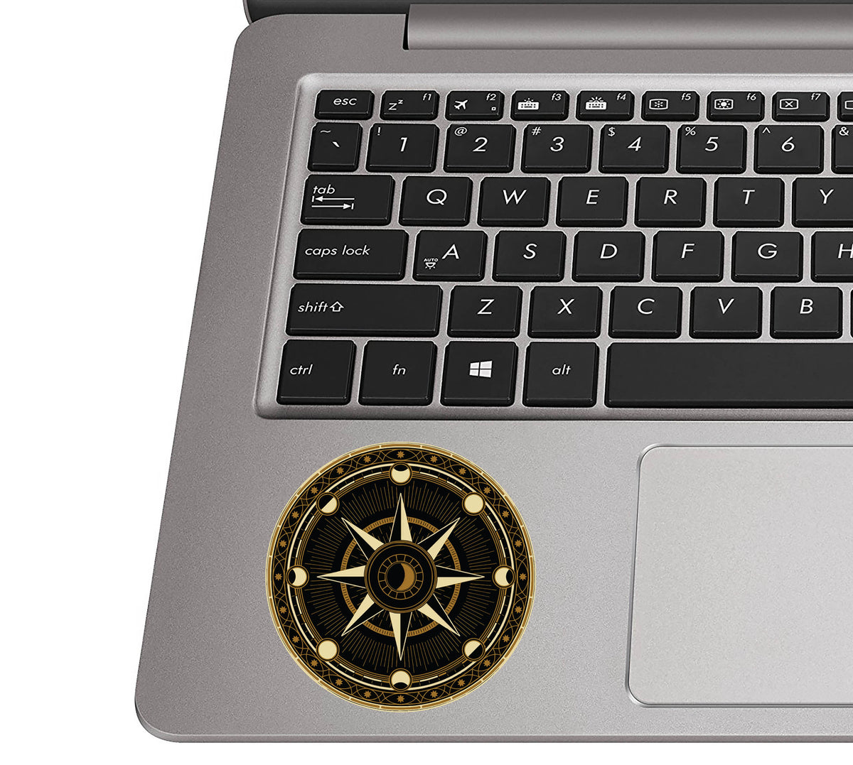 Traitors Round Table vinyl sticker applied to a laptop palm rest
