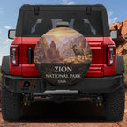 Zion National Park spare tire cover mounted on a Ford Bronco tailgate