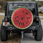 Watermelon half spare tire cover with juicy pink fruit slice and green rind summer design