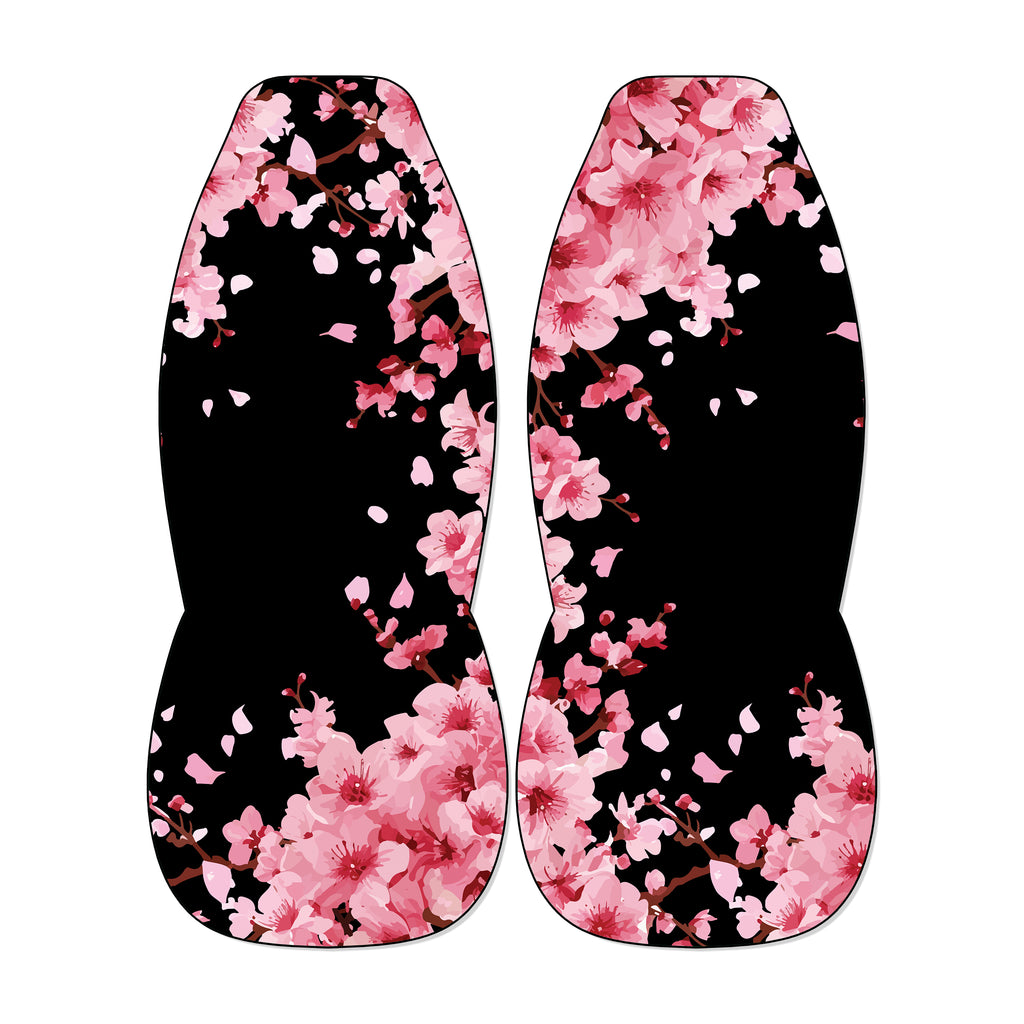 two identical flower-patterned objects, one on each side, with pink flowers and petals against a black background.