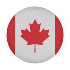 Canadian Maple Leaf flag spare tire cover on red Jeep Wrangler with desert backdrop featuring red and white design