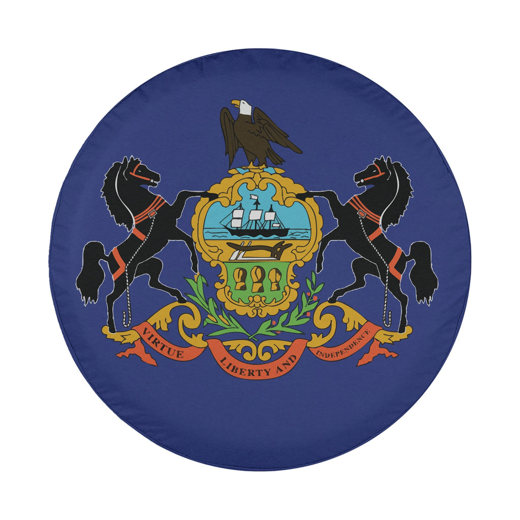 Pennsylvania state flag spare tire cover on red Jeep Wrangler with desert background showing state coat of arms